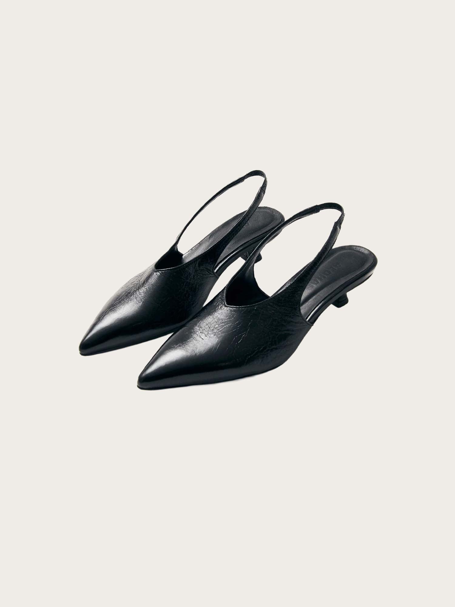 Eros Black Leather Pumps