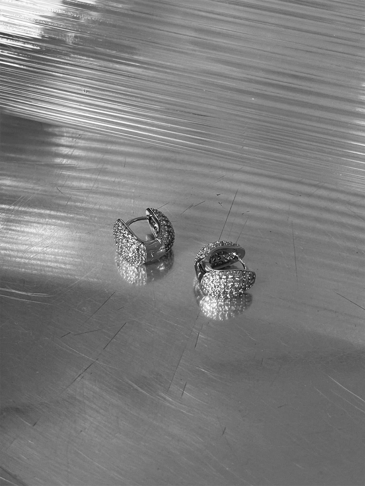 Elysian Pavé Huggies - Silver