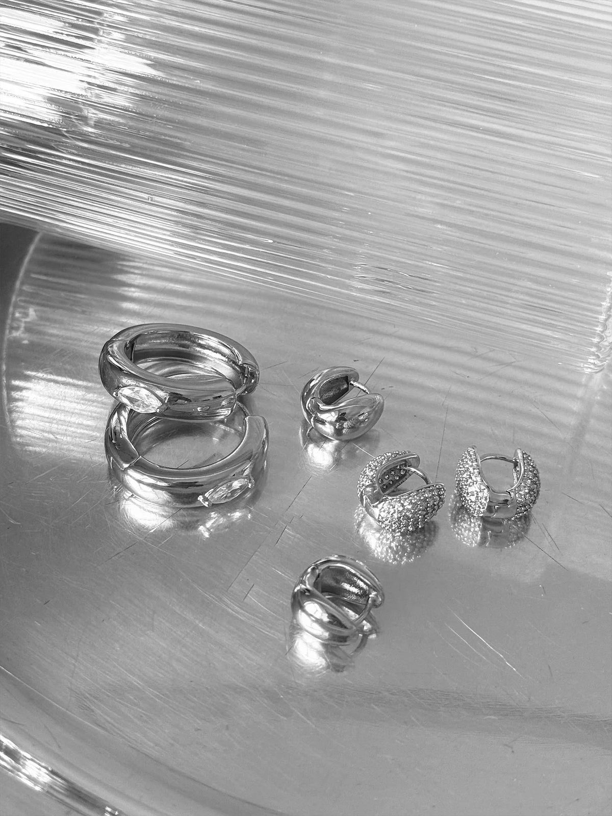 Elysian Pavé Huggies - Silver
